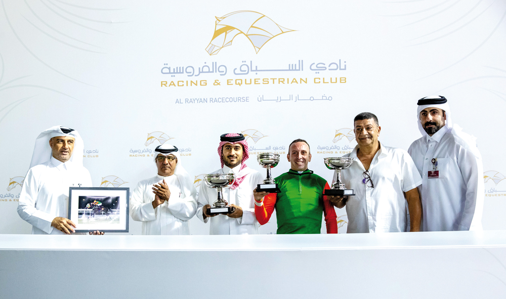 The connection of Royal Rose celebrate after the Al Thakira Cup win at Al Rayyan Racecourse yesterday. Pictures:
 Juhaim/QREC  