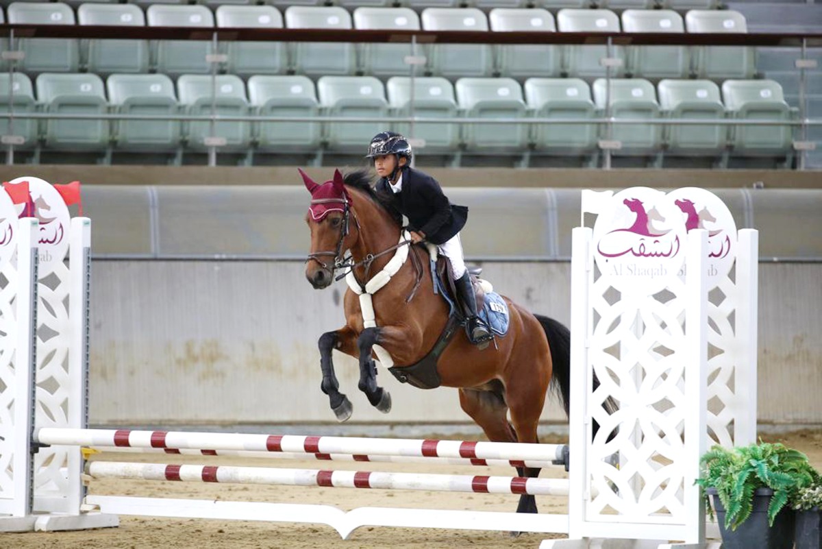 Alqaqaa Tamim bin Hamad Al Thani guides Grietje W S over a fence in the Intro 2 class event.