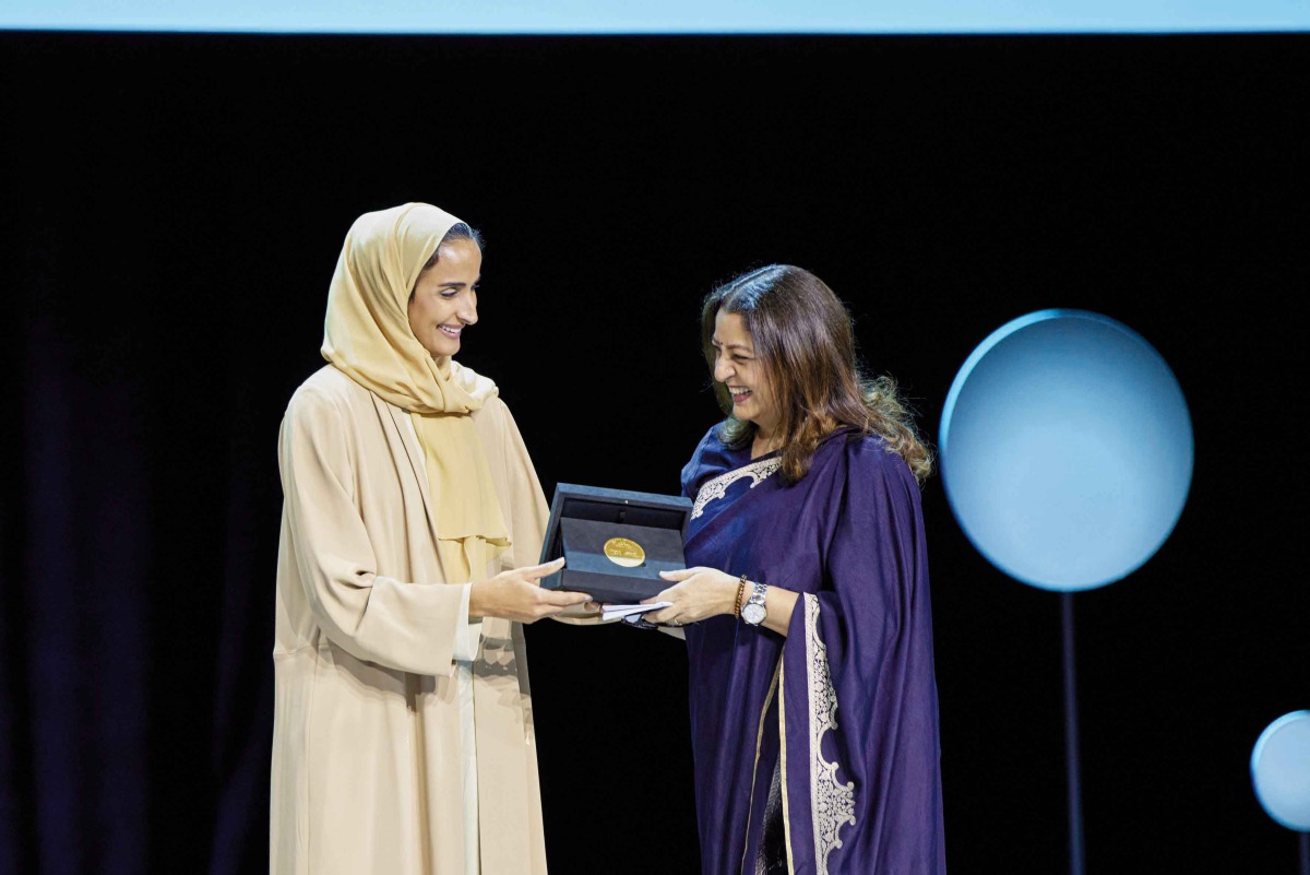 H E Sheikha Hind bint Hamad Al Thani, Vice Chairperson and CEO of Qatar Foundation, presenting the Wise Prize for Education to Safeena Husain, Founder and board member of Educate Girls at the 11th  WISE Summit, which began at Qatar National Convention Centre in Doha, yesterday.