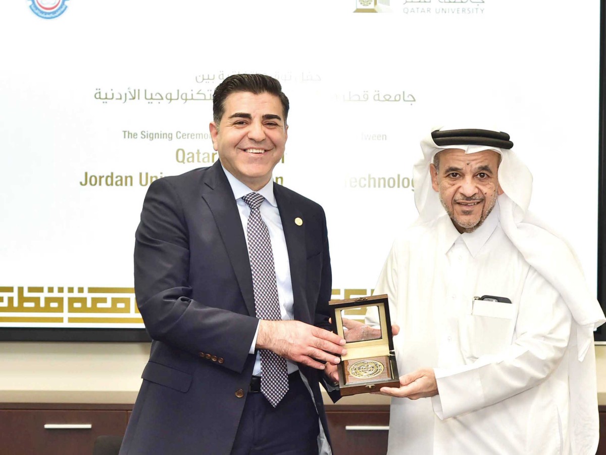 QU President Dr. Omar Al Ansari with President of JUST Prof Khalid El Salem  during the MoU signing ceremony.