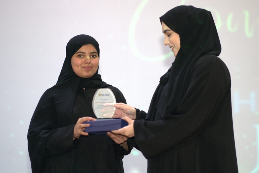 Reema Abdulaziz Al Ghali a student of Doha Academy receiving the award.