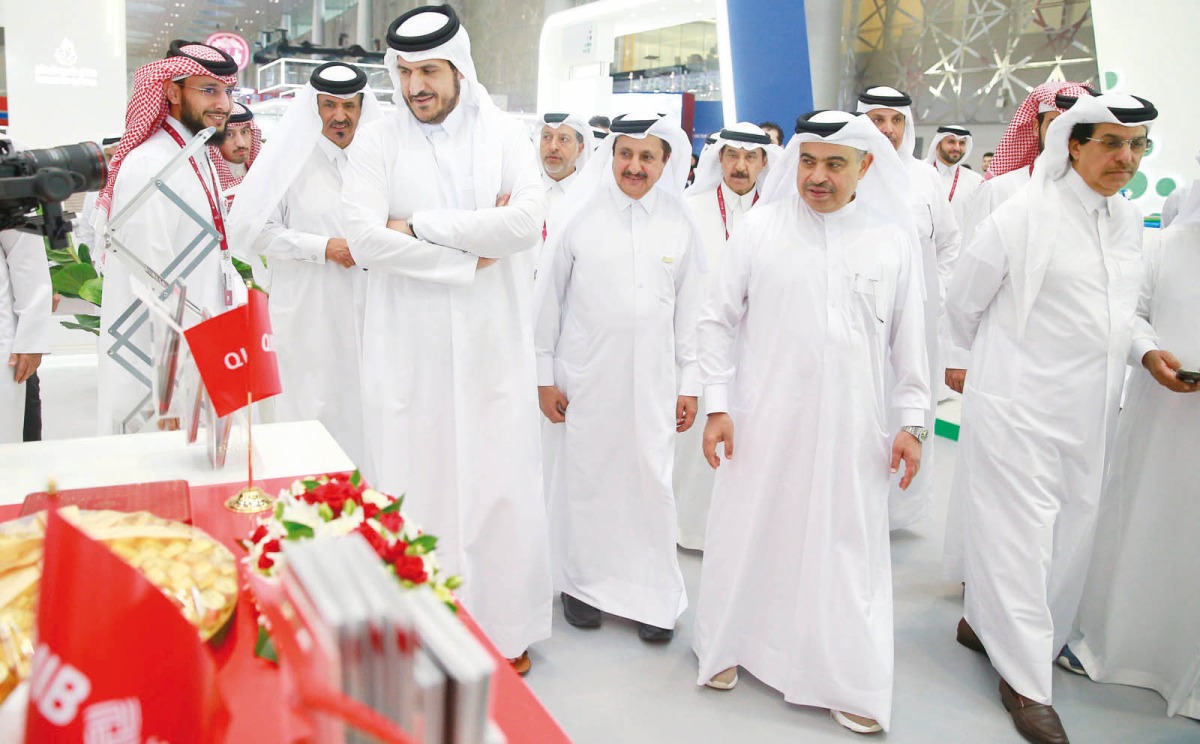 Minister of Commerce and Industry H E Sheikh Mohammed bin Hamad bin Qassim Al Abdullah Al Thani, Minister of Finance H E Ali bin Ahmed Al Kuwari, Qatar Chamber Chairman Sheikh Khalifa bin Jassim Al Thani with other officials visiting a pavilion during the inauguration of Made in Qatar 2023 exhibition, yesterday. Pic: Rajan Vadakkemuryil / The Peninsula 