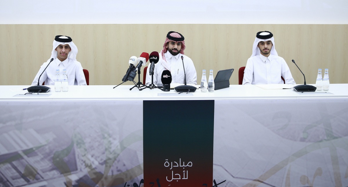 Al Kass Channel anchor Majed Al Mansouri (centre) along with Qatar Academy Doha students Nayef Rashid Al Kubaisi and Mahdi Hussein Al Ahbabi during a press conference at Education City Stadium yesterday. PIC: Mohammed Farag