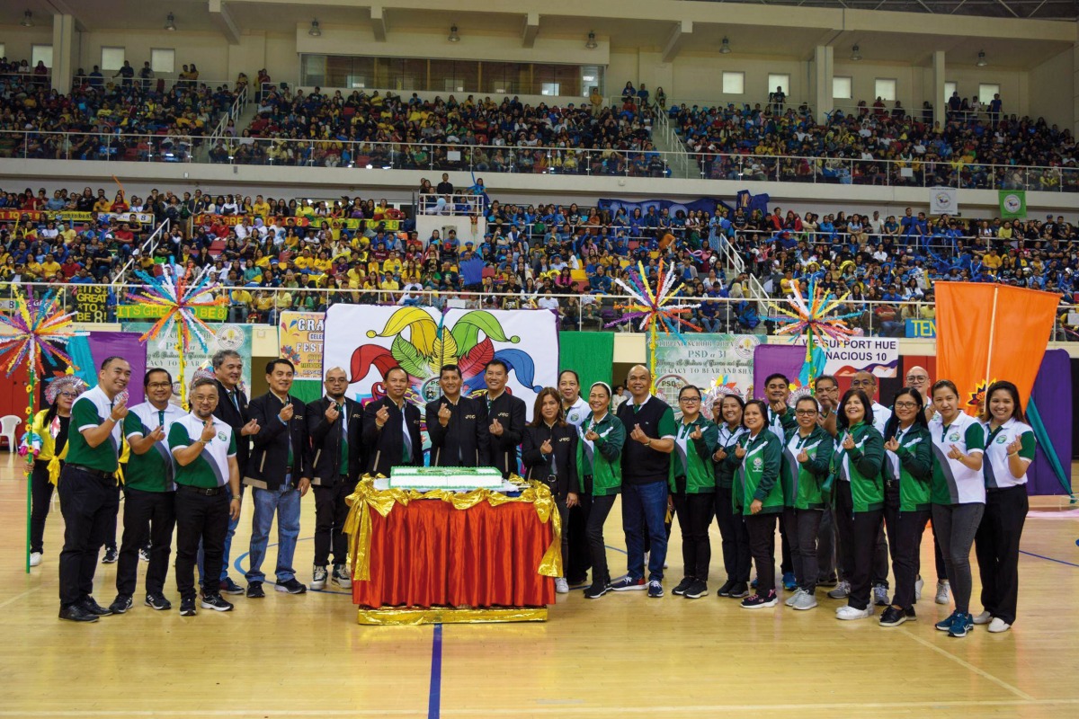 Officials and students at the event.