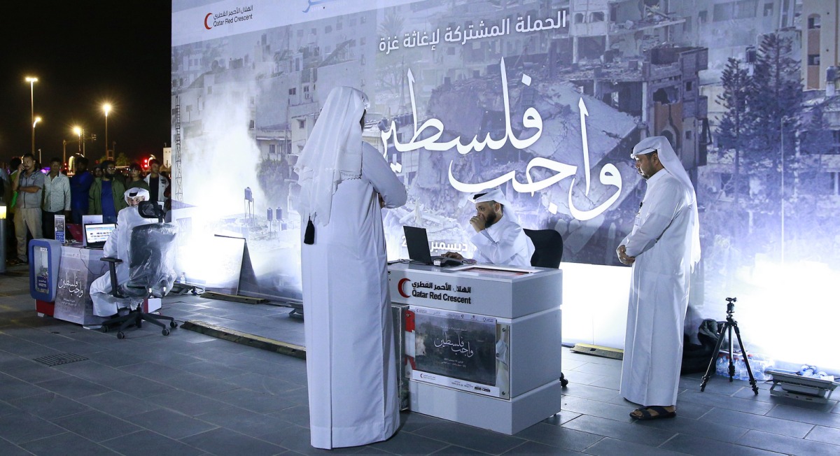 A booth set-up at Souq Waqif as part of the ‘Palestine Duty Relief’ campaign to receive donations from indivisuals yesterday.