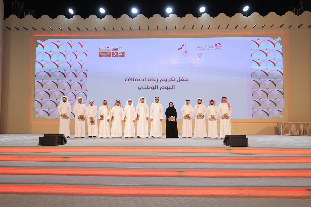 Minister of Culture H E Sheikh Abdulrahman bin Hamad Al Thani (sixth right) honouring sponsors of Qatar National Day events at the main stage of Darb Al Saai 2023 on Wednesday.
