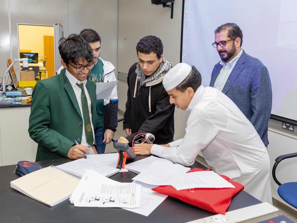 Dr Mohammad Yousef of WCM-Q (second right) leads a physics training session for local high school students in preparation for IJSO, held in Thailand recently.  