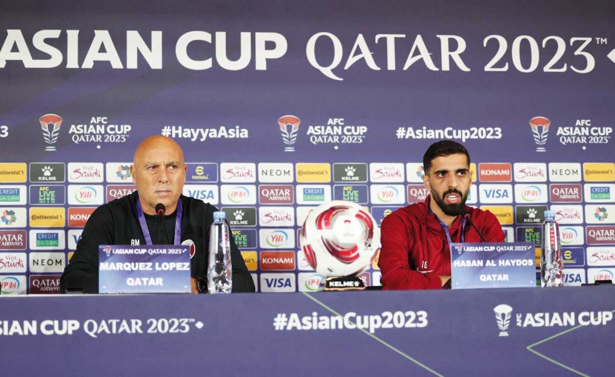 Qatar coach Marquez Lopez and captain Hassan Al Haydos during the press conference yesterday.