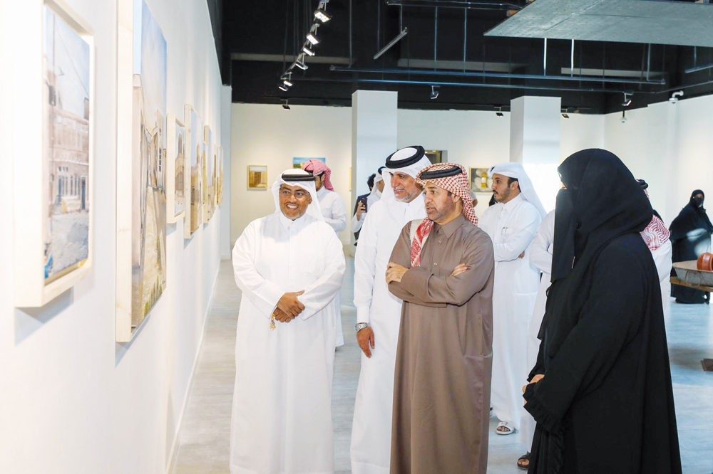 Prof. Dr. Khalid bin Ibrahim Al Sulaiti, General Manager of Cultural Village Foundation, Katara (second right) along with other officials and artist during the opening of “Taraab” exhibition.