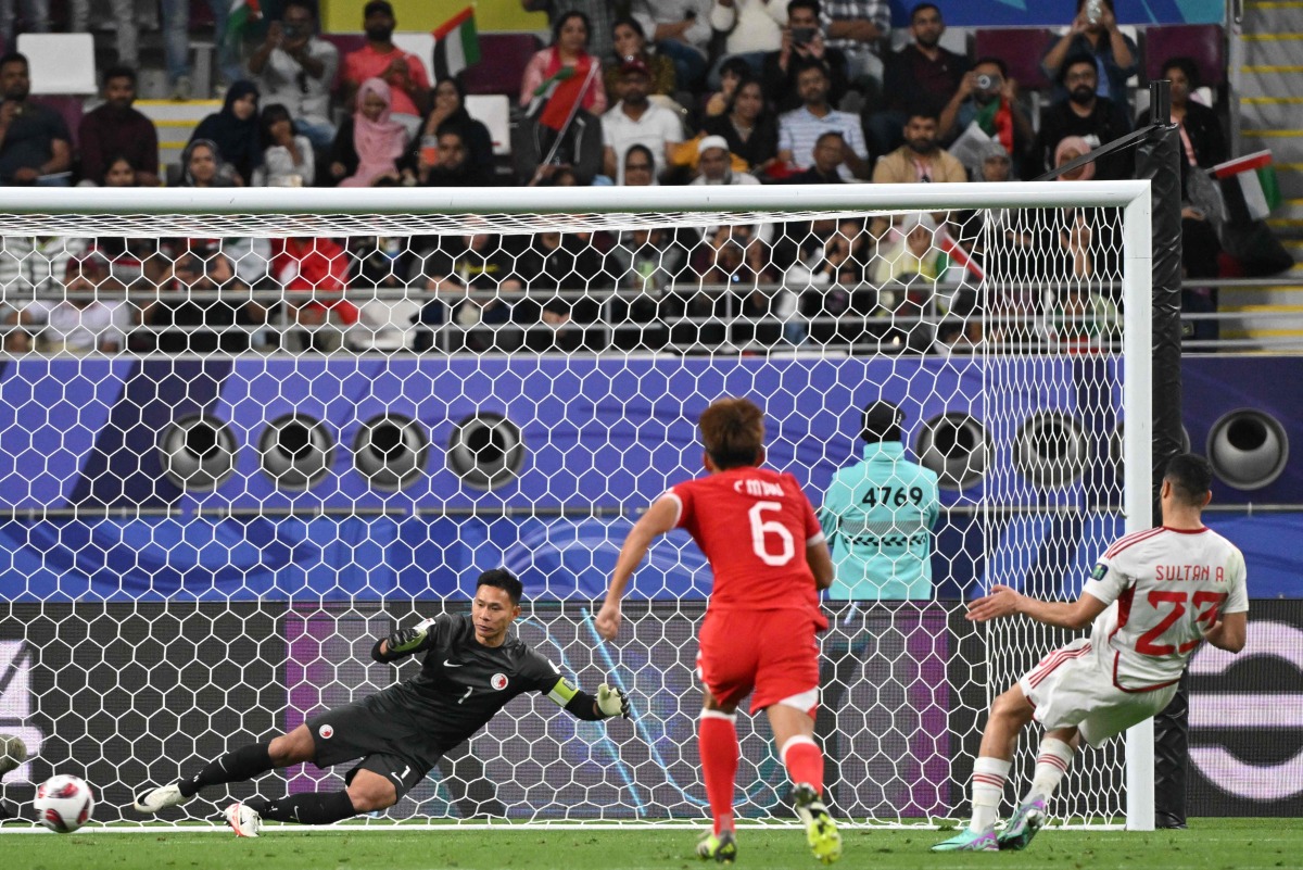 UAE Sultan Adil (right) scores a goal against Hong Kong, yesterday. AFP