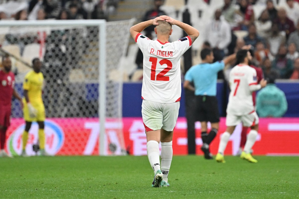 Lebanon's defender #12 Robert Melki reacts after a missed chance during the AFC Qatar 2023 Asian Cup Group A football match between Qatar and Lebanon at the Lusail Stadium in Lusail, north of Doha on January 12, 2024. (Photo by HECTOR RETAMAL / AFP)
