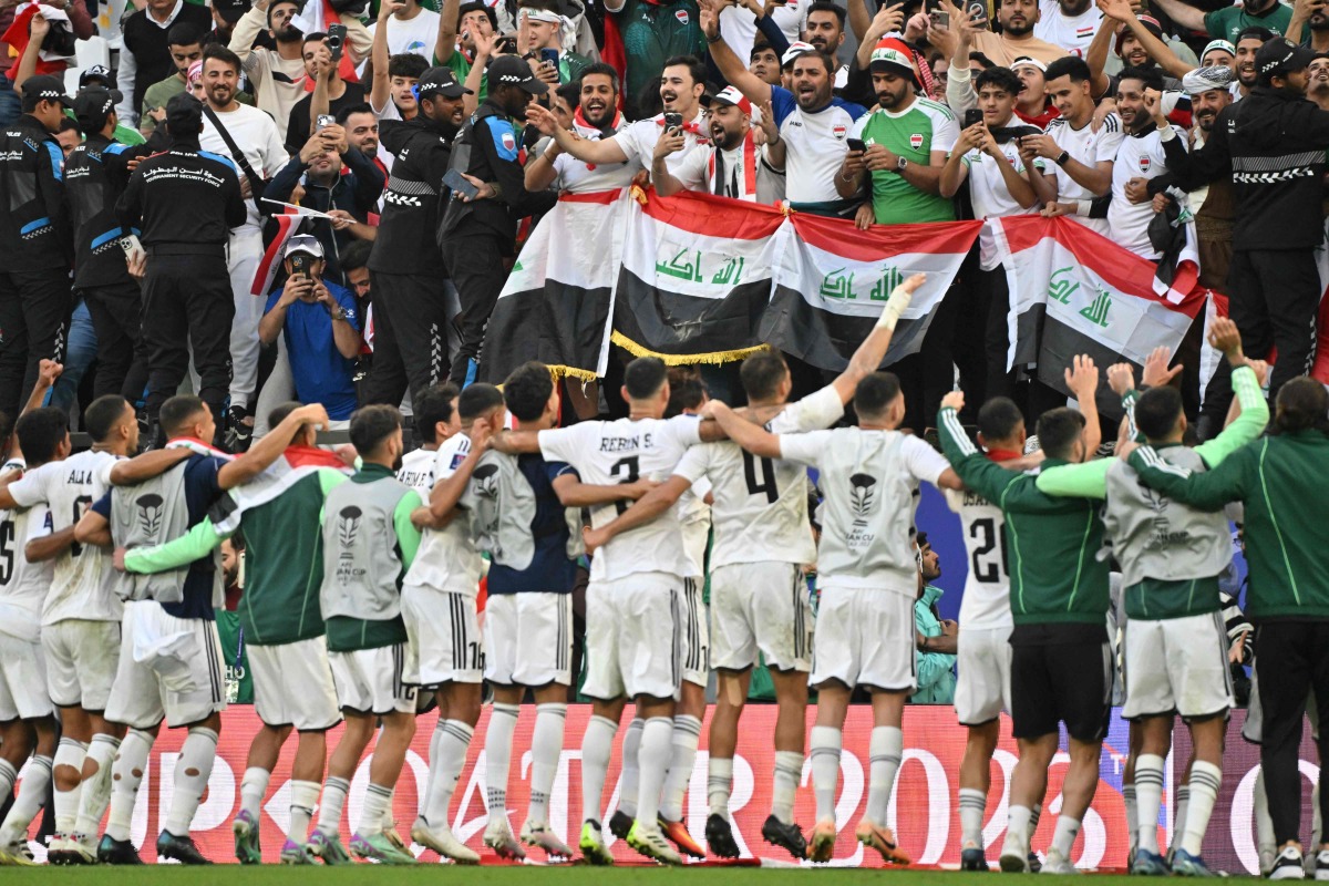 Iraq's players applaud the fans at the end of the Qatar 2023 AFC Asian Cup Group D football match between Iraq and Japan at the Education City Stadium in Al-Rayyan, west of Doha on January 19, 2024. (Photo by HECTOR RETAMAL / AFP)