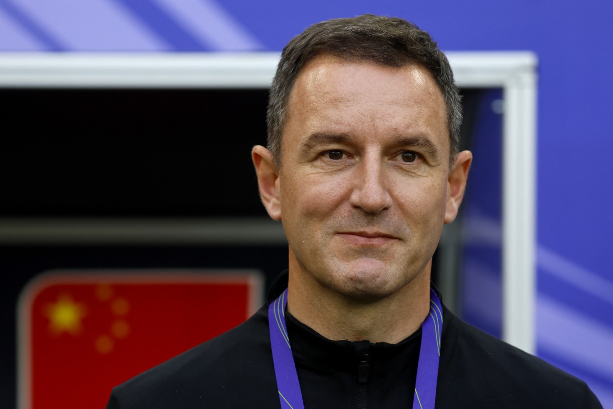 China's Serbian coach Aleksandar Jankovic looks on during the Qatar 2023 AFC Asian Cup Group A football match between Lebanon and China at the Al-Thumama Stadium in Doha on January 17, 2024. (Photo by KARIM JAAFAR / AFP)
