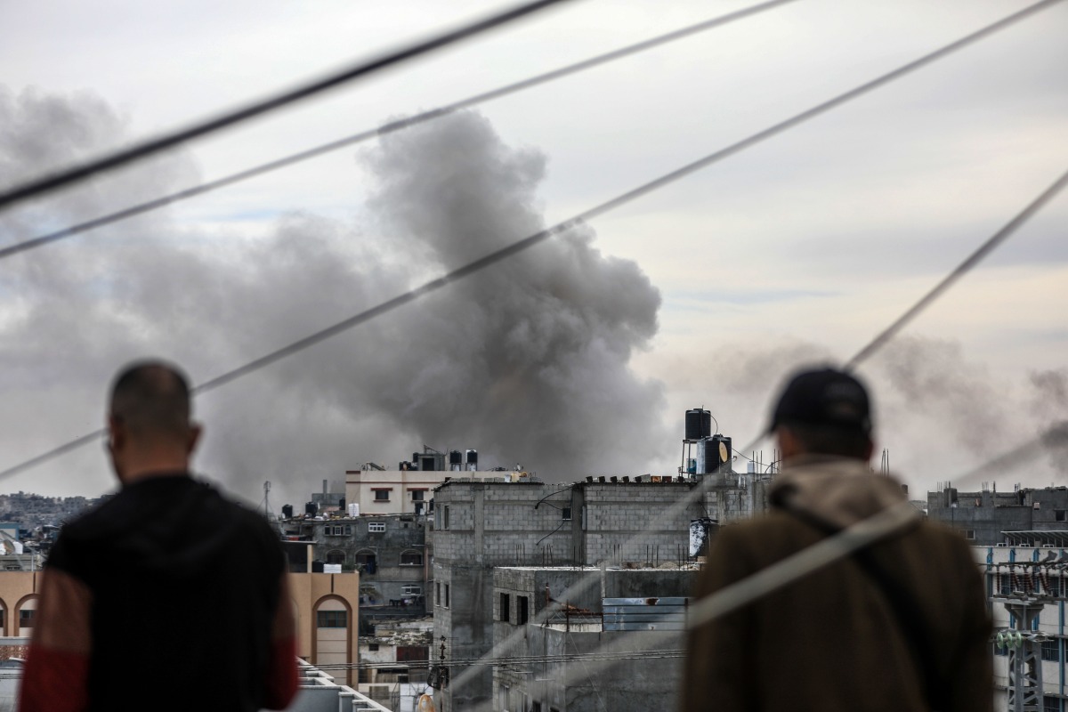 Smoke rises following an Israeli airstrike in the southern Gaza Strip city of Khan Younis, on Jan. 21, 2024. (Photo by Yasser Qudih/Xinhua)
