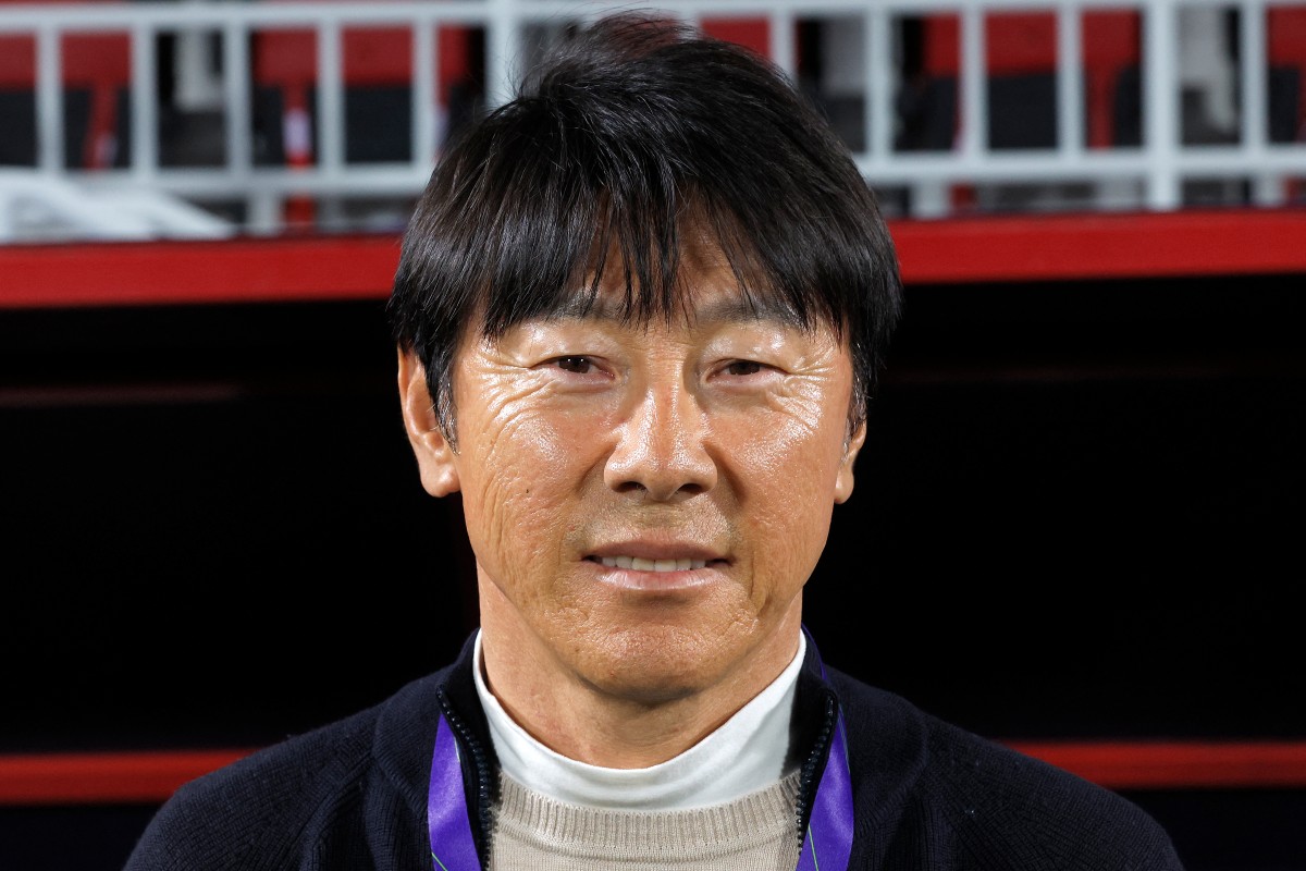 Indonesia's South Korean coach Shin Tae-yong watches the Qatar 2023 AFC Asian Cup Group D football match between Vietnam and Indonesia at the Abdullah bin Khalifa Stadium in Doha on January 19, 2024. (Photo by KARIM JAAFAR / AFP)
