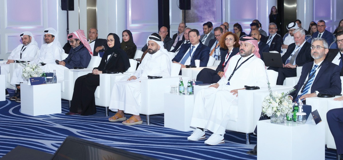 QCB Assistant Governor, Financial Stability Sector, Maha Sultan Al Sowaidi (fourth right); QFC CEO Yousuf Mohamed Al Jaida (third right) with other dignitaries and officials during the Qatar Financial Market Forum, yesterday PIC: Mohamed Farag