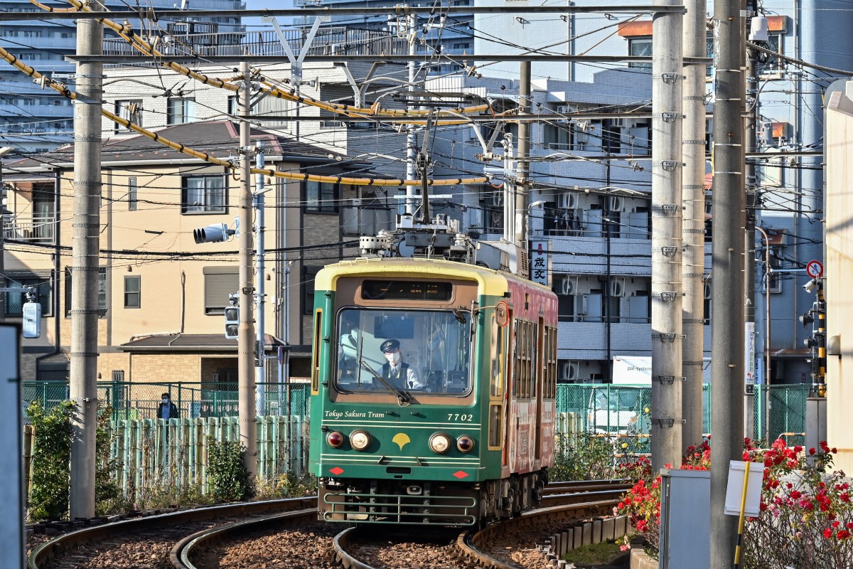 A driver guides a tram along the Toden Arakawa Line, also known as Tokyo Sakura tram, in Arakawa Ward in Tokyo on January 23, 2024. (Photo by Richard A. Brooks / AFP)