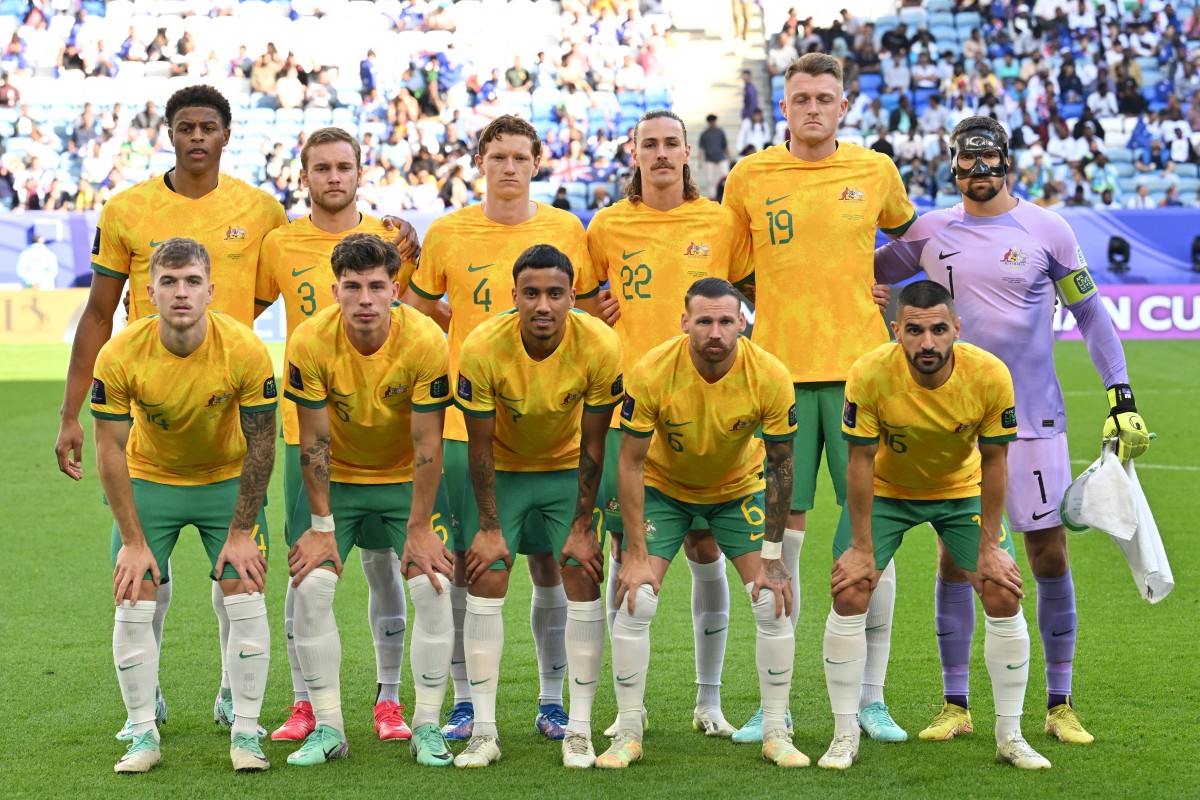 (Top L to R) Australia's forward #10 Kusini Yengi, Australia's defender #03 Nathaniel Atkinson, Australia's defender #04 Kye Rowles, Australia's midfielder #22 Jackson Irvine, Australia's defender #19 Harry Souttar, Australia's goalkeeper #01 Mathew Ryan, (bottom L to R) Australia's midfielder #14 Riley McGree, Australia's defender #05 Jordan Bos, Australia's midfielder #17 Keanu Baccus, Australia's forward #06 Martin Boyle and Australia's defender #16 Aziz Behich pose for a team picture during the Qatar 2023 AFC Asian Cup Group B football match between Australia and Uzbekistan at the Al-Janoub Stadium in Al-Wakrah, south of Doha on January 23, 2024. (Photo by HECTOR RETAMAL / AFP)