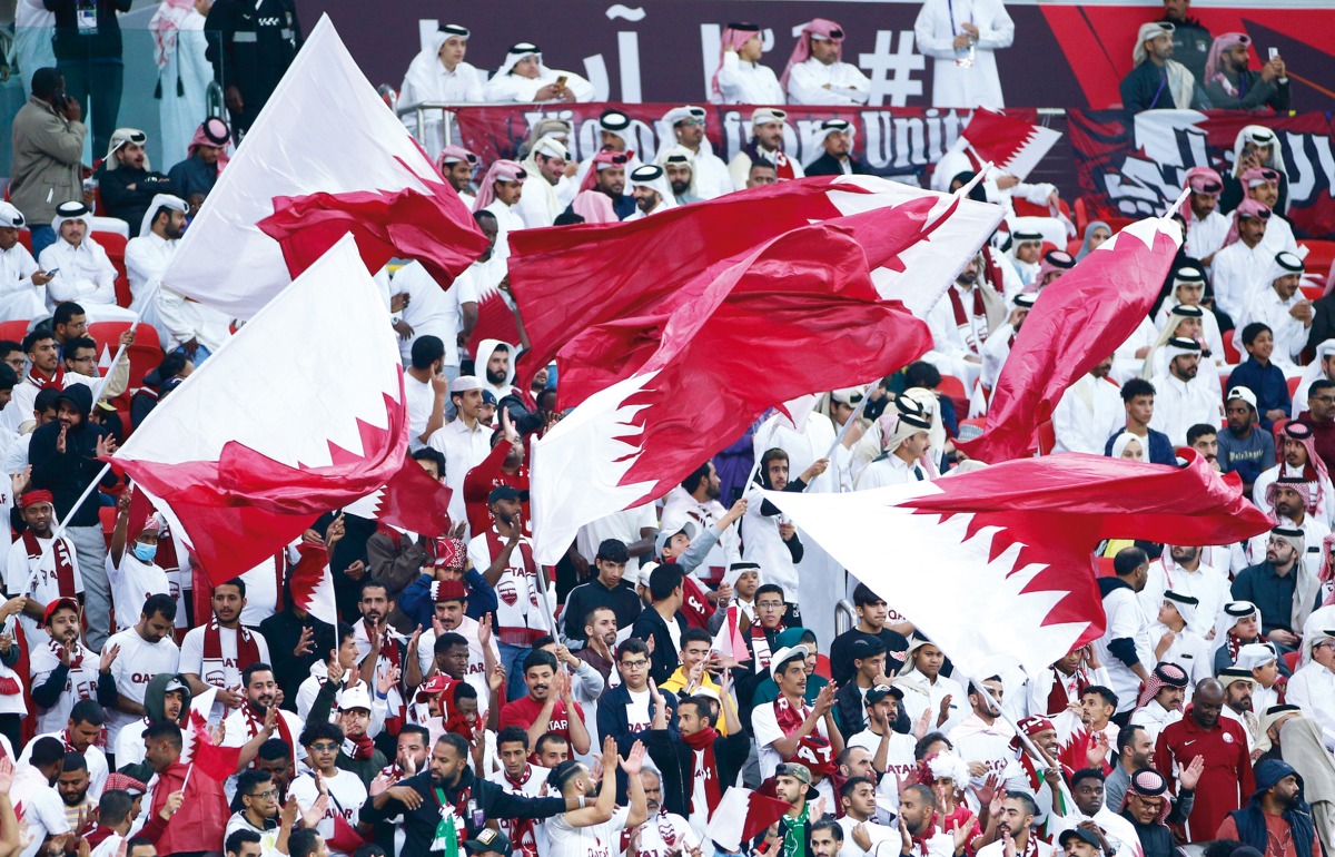 Qatar's Hassan Al-Haydos celebrates scoring his team's first goal during the AFC Asian Cup Qatar 2023 football match between Qatar and Palestine at Al Bayt Stadium in Al Khor, north of Doha, on January 29, 2024. (Photo by Giuseppe Cacace / AFP)