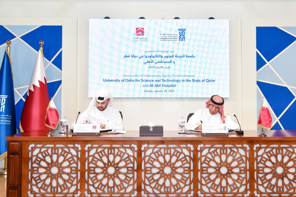 President of UDST Dr. Salem Al Naemi (right) and CEO of Medicare Group QPSC and Al Ahli Hospital Khaled Al Emadi during the MoU signing.