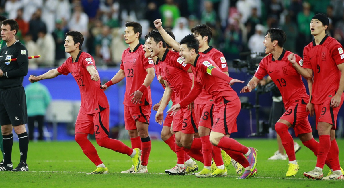 South Korea players celebrate after the win.