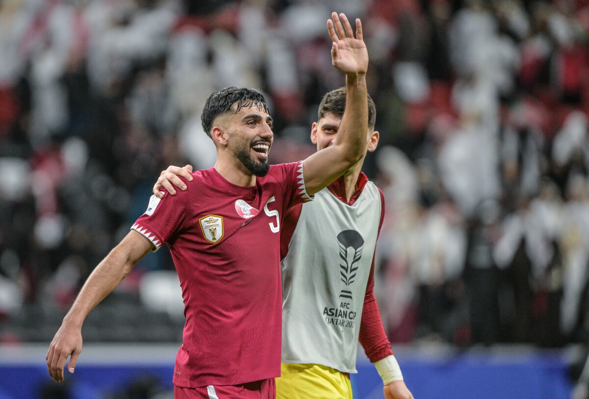 Tarek Salman (left) celebrates with a teammate.