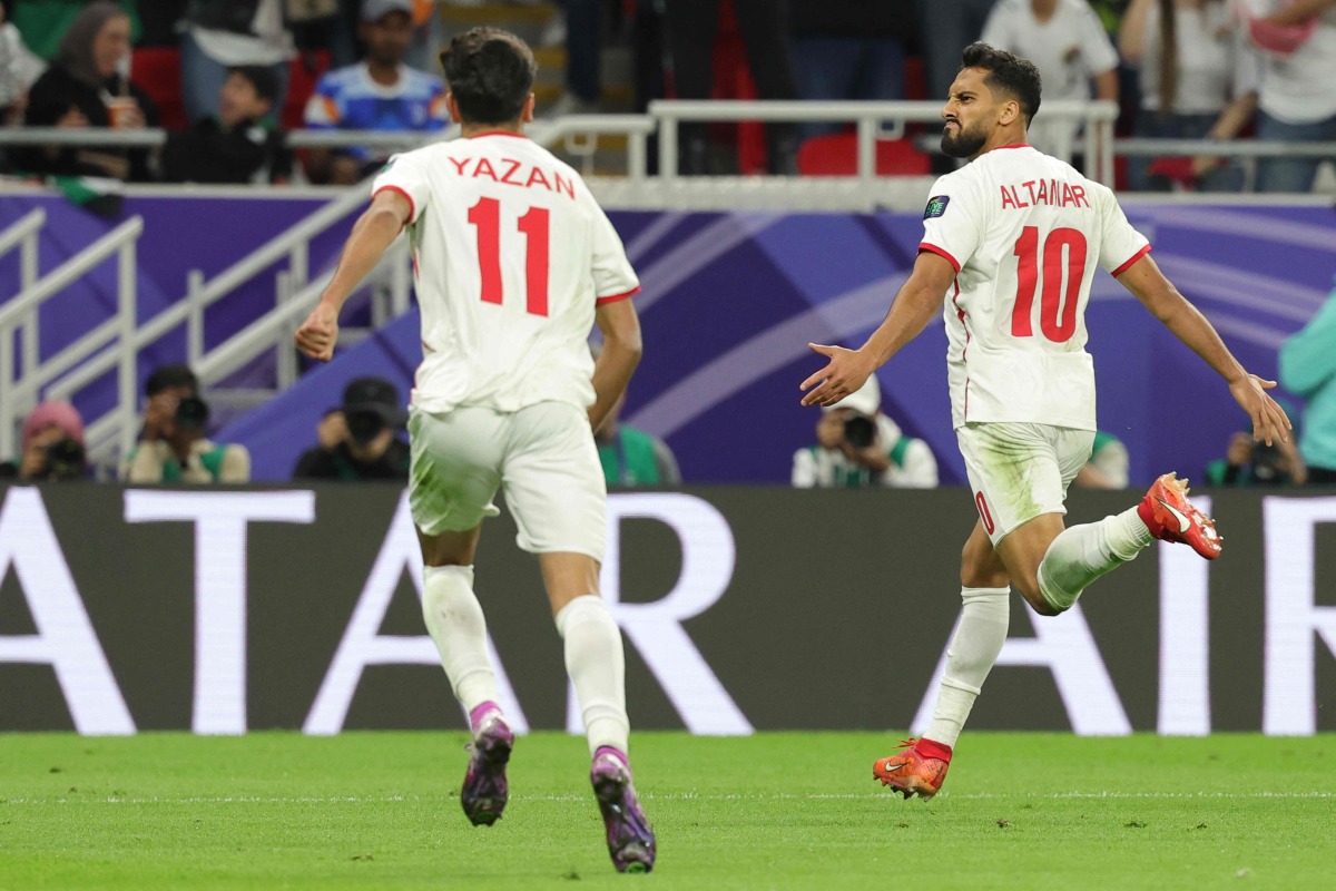 Jordan's Mousa Al Tamari celebrates his goal against South Korea in the semi-final. 