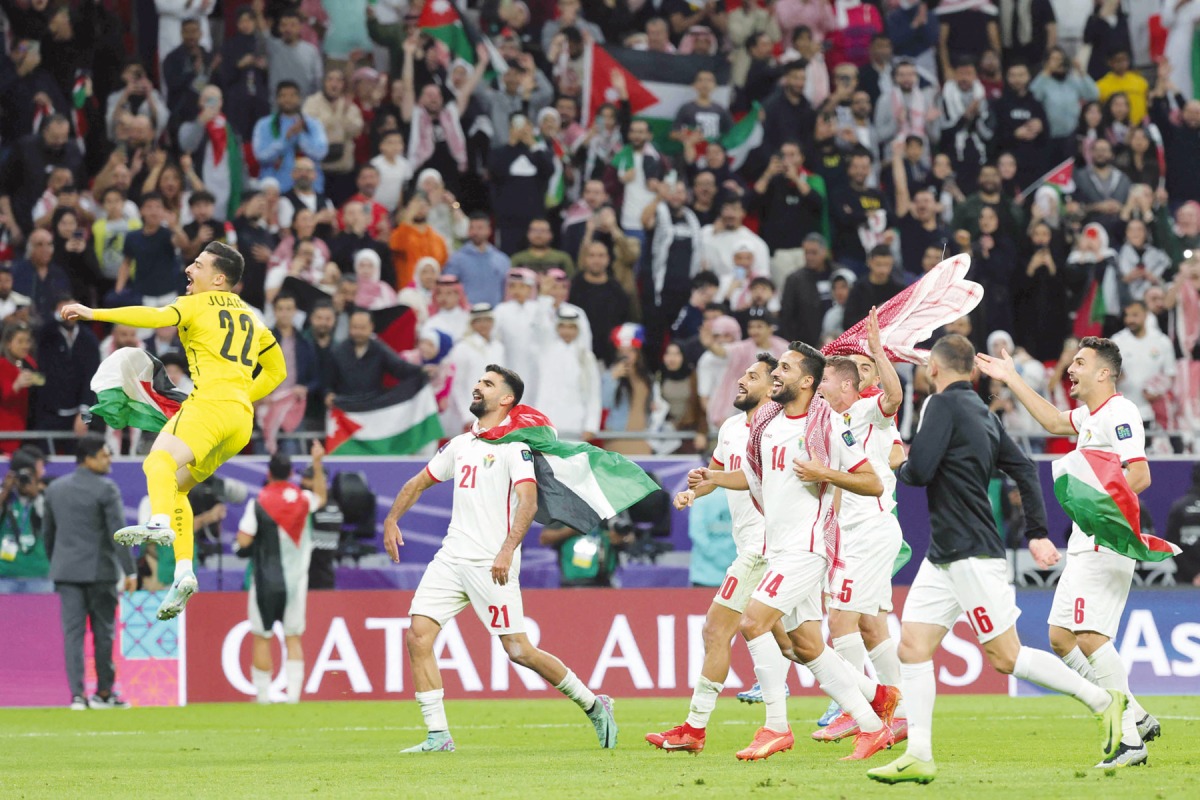 Jordan’s players celebrate after defeating South Korea in the semi-final.