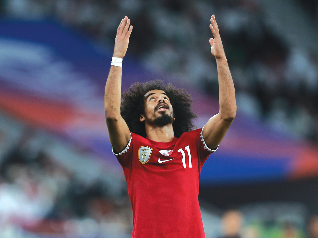 Akram Afif celebrates during the semi-final against Iran. 