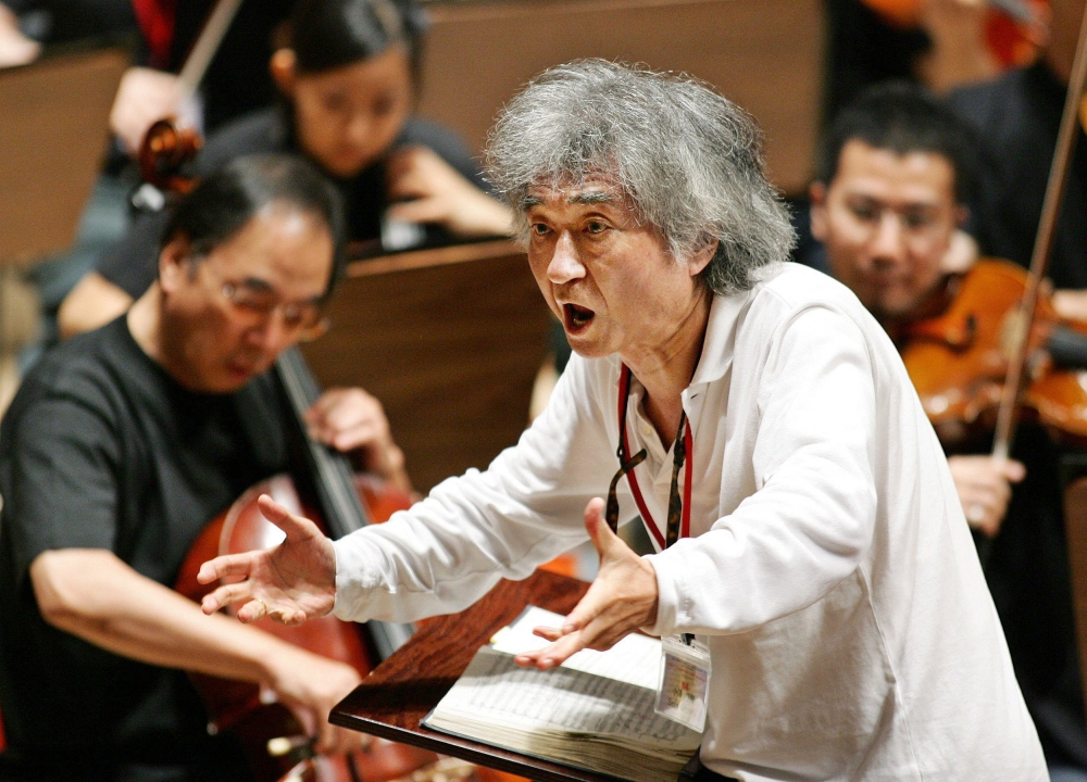 This file photo taken on July 19, 2006 shows Japanese conductor Seiji Ozawa conducting a performance of Mahler's Symphony No. 2 ''Resurrection'' during a rehearsal at the Aichi Prefectural Theater in Nagoya, central Japan. Photo by JIJI PRESS / AFP