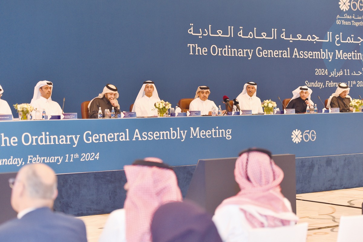 Minister of Finance and Chairman of QNB Group H E Ali Ahmed Al Kuwari (fourth right) along with Board of Directors during the Ordinary General Assembly held at Fairmont Doha, yesterday.