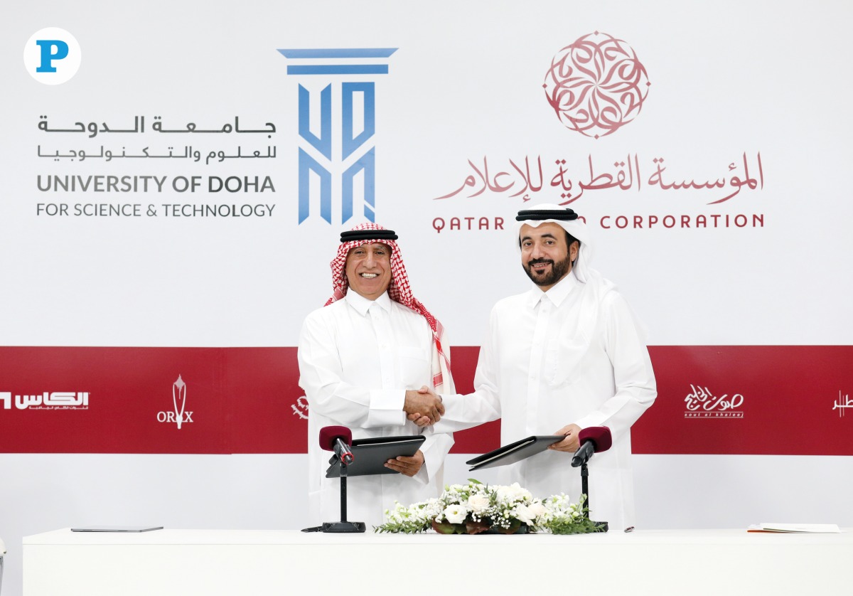 CEO of QMC H E Sheikh Abdulaziz bin Thani bin Khaled Al Thani (right) and UDST President Dr. Salem Al Naemi exchanging documents after signing the MoU. Pictures by: Salim Matramkot/The Peninsula