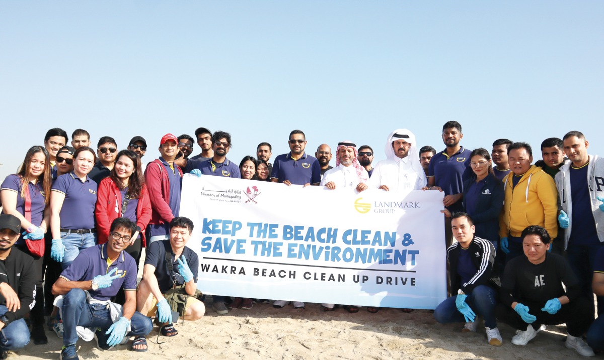  Landmark Group Qatar employees during a clean drive at Wakrah Family Beach.