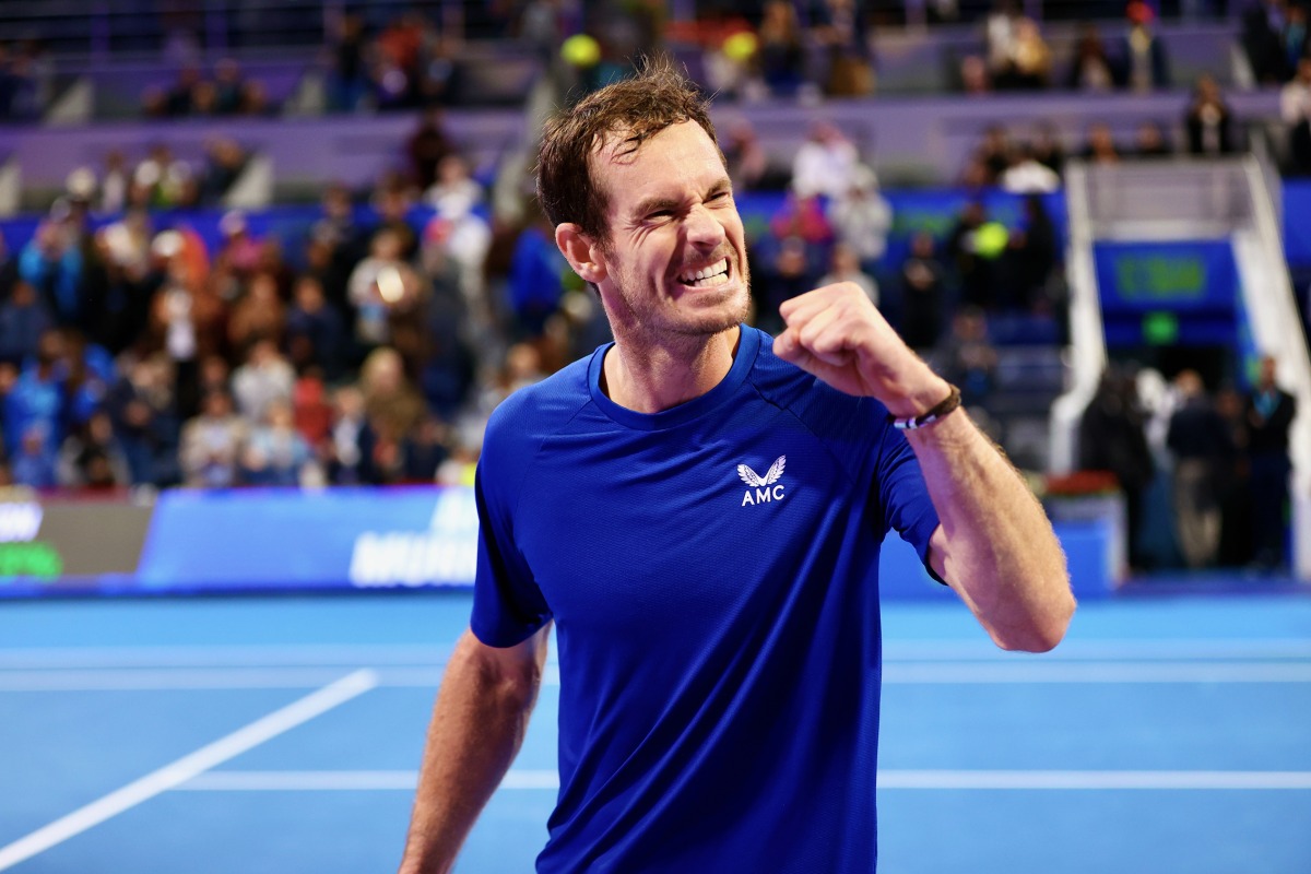 Andy Murray celebrates after defeating Alexandre Muller.