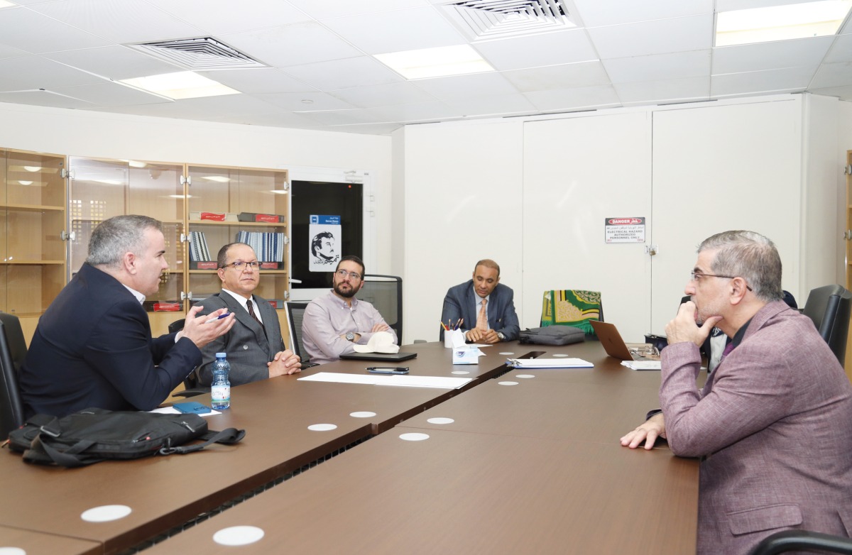 Professor Dr. Yamine Boudhane (left), Lecturer Dr. Mohsen M. S. Alafranji (first right), Associate Professor Dr. Kamal Hamidou (second left), Prof. Dr. Abdulrahman Mohammed Al Shami (second right), and Abdul Hamid Samouh Maassarani, Lab Technician, during a seminar at the Department of Mass Communication, Qatar University, yesterday. (Photo: Salim Matramkot,The Peninsula)