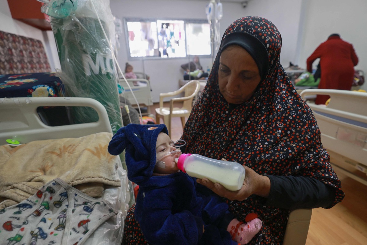 Palestinian children suffering from malnutrition receive treatment at a healthcare center in Rafah in the southern gaza Strip on March 5, 2024 (Photo by MOHAMMED ABED / AFP)