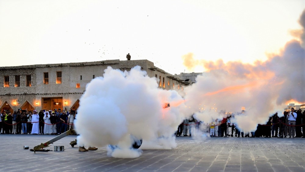 File: Iftar cannon firing at Souq Waqif