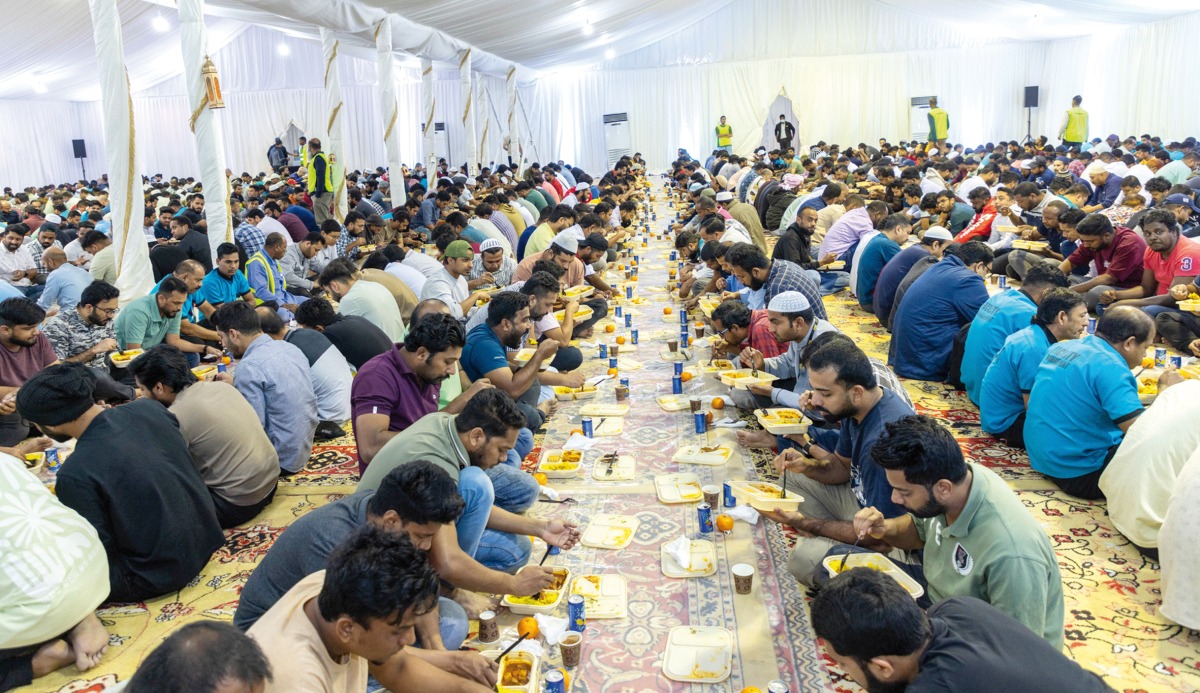 People break their fast during one of Education City's community Iftar.