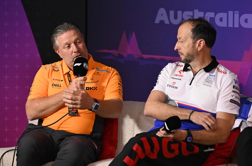 McLaren Racing CEO Zak Brown (L) and RB's CEO Peter Bayer attend a press conference after the first practice session of the Formula One Australian Grand Prix at the Albert Park Circuit in Melbourne on March 22, 2024. Photo by WILLIAM WEST / AFP