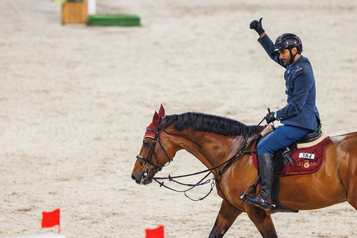 Mohammed Saeed Haidan celebrates astride Obama after winning the Big Tour round.