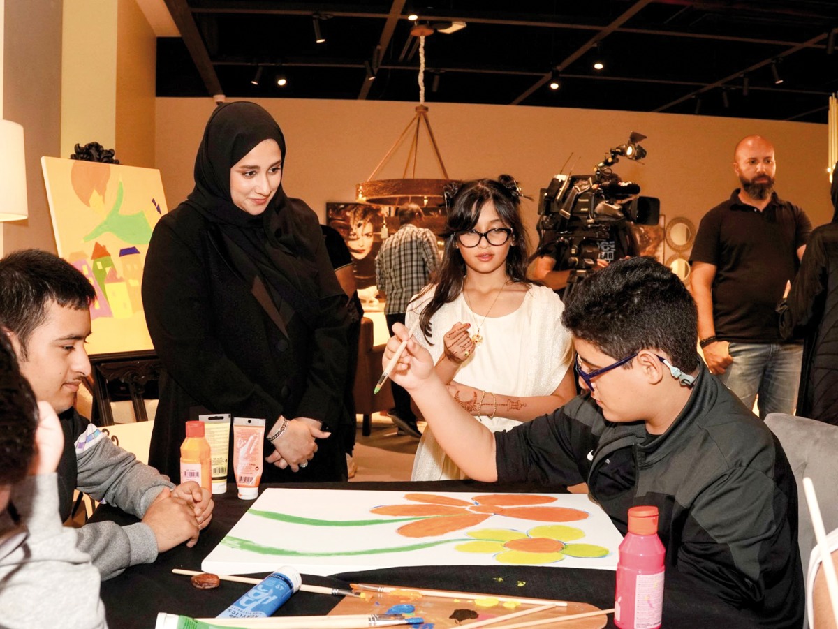 Maryam Saif Al Suwaidi, the Executive Director of the Shafallah Center, interacting with students.