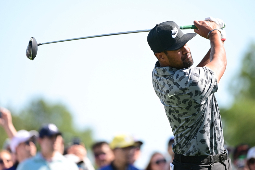 Tony Finau of the United States hits a tee shot on the fourth hole during the second round of the Texas Children's Houston Open at Memorial Park Golf Course on March 29, 2024 in Houston, Texas. (Photo by Logan Riely / GETTY IMAGES NORTH AMERICA / Getty Images via AFP)
