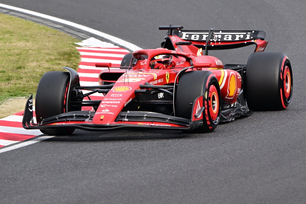 Ferrari's Monegasque driver Charles Leclerc takes part in the qualifying session for the Formula One Japanese Grand Prix race at the Suzuka circuit in Suzuka, Mie prefecture on April 6, 2024. (Photo by Yuichi YAMAZAKI / AFP)
