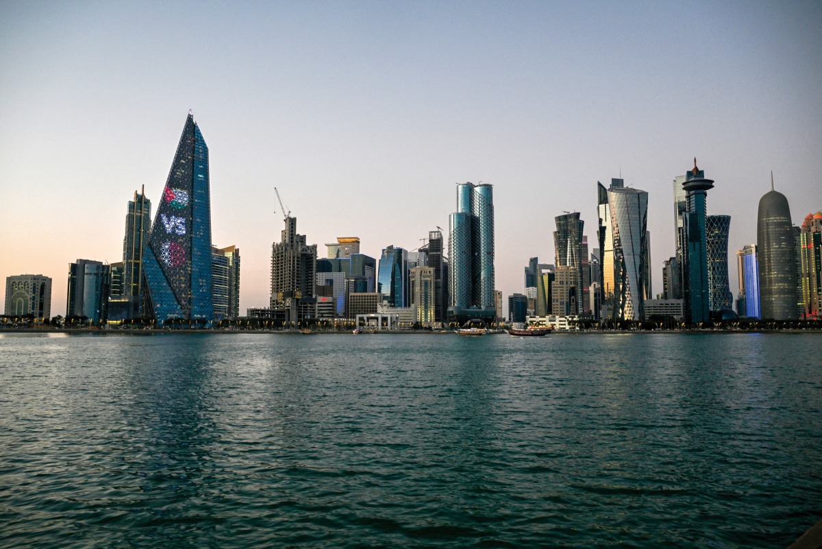 A file photo of traditional Qatari Dhow boats seen in front of Doha’s skyline at the Corniche promenade in Doha. (AFP)