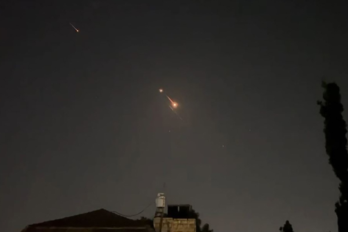 This video grab from AFPTV taken on April 14, 2024 shows explosions lighting up Jerusalem sky during iranian attack on Israel. (Photo by AFPTV / AFP)