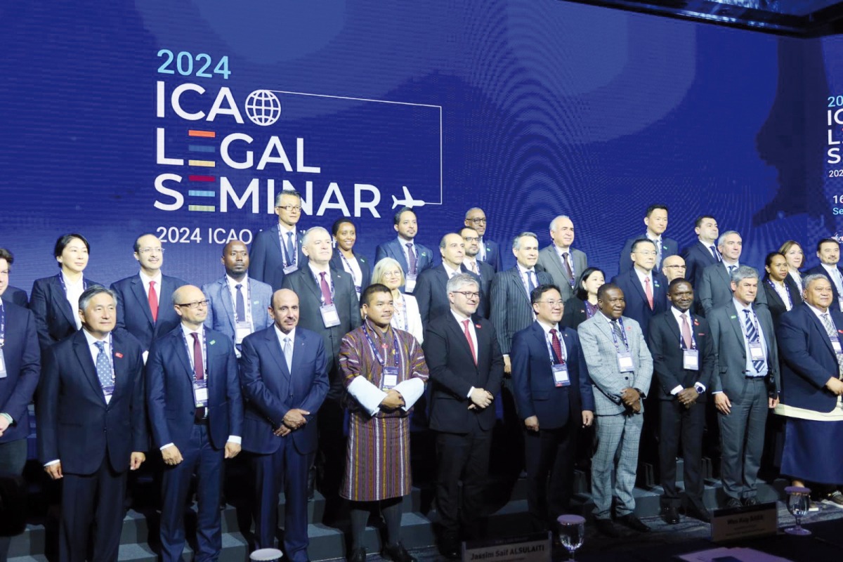 Minister of Transport H E Jassim Saif Ahmed Al Sulaiti (third left, front row) with other delegates at the ICAO conference in Seoul, South Korea.