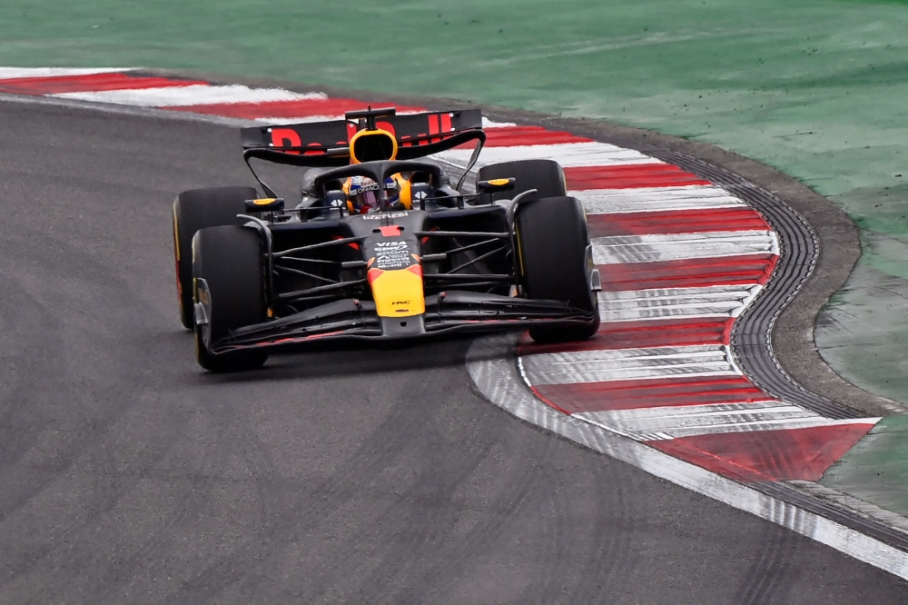 Red Bull Racing's Dutch driver Max Verstappen drives during the sprint race ahead of the Formula One Chinese Grand Prix at the Shanghai International Circuit in Shanghai on April 20, 2024. (Photo by Pedro Pardo / AFP)