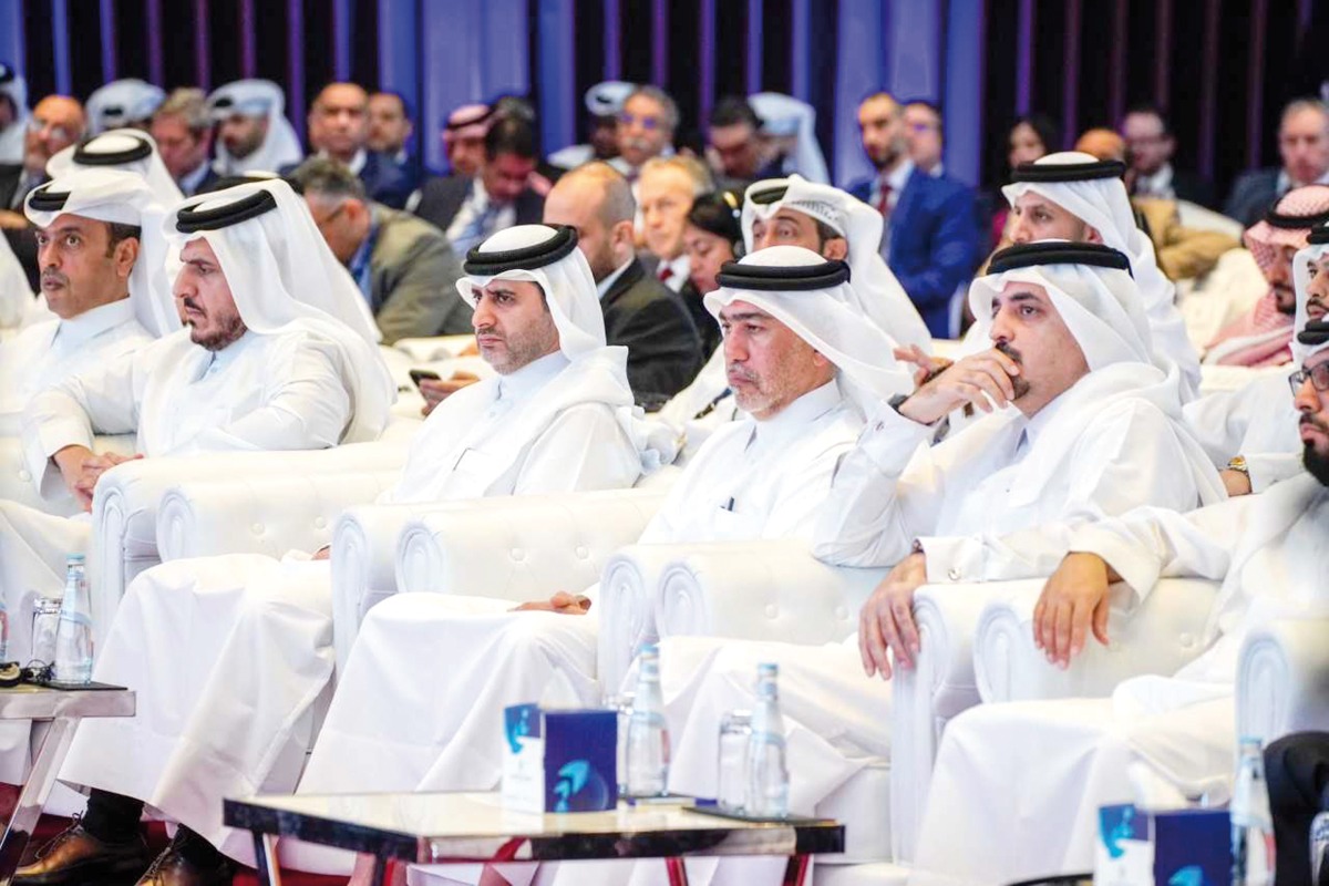 Minister of Commerce and Industry H E Sheikh Mohammed bin Hamad bin Qassim Al Thani; QCB Governor H E Sheikh Bandar bin Mohammed bin Saoud Al Thani; QFMA CEO Dr. Tamy bin Ahmad Al Binali with other dignitaries during the conference.