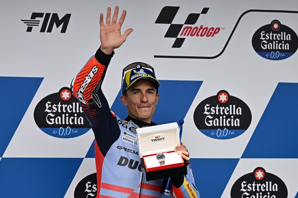 Ducati Spanish rider Marc Marquez celebrates after taking the pole position during the qualifier session of the MotoGP Spanish Grand Prix at the Jerez racetrack in Jerez de la Frontera on April 27, 2024. (Photo by Jorge Guerrero / AFP)