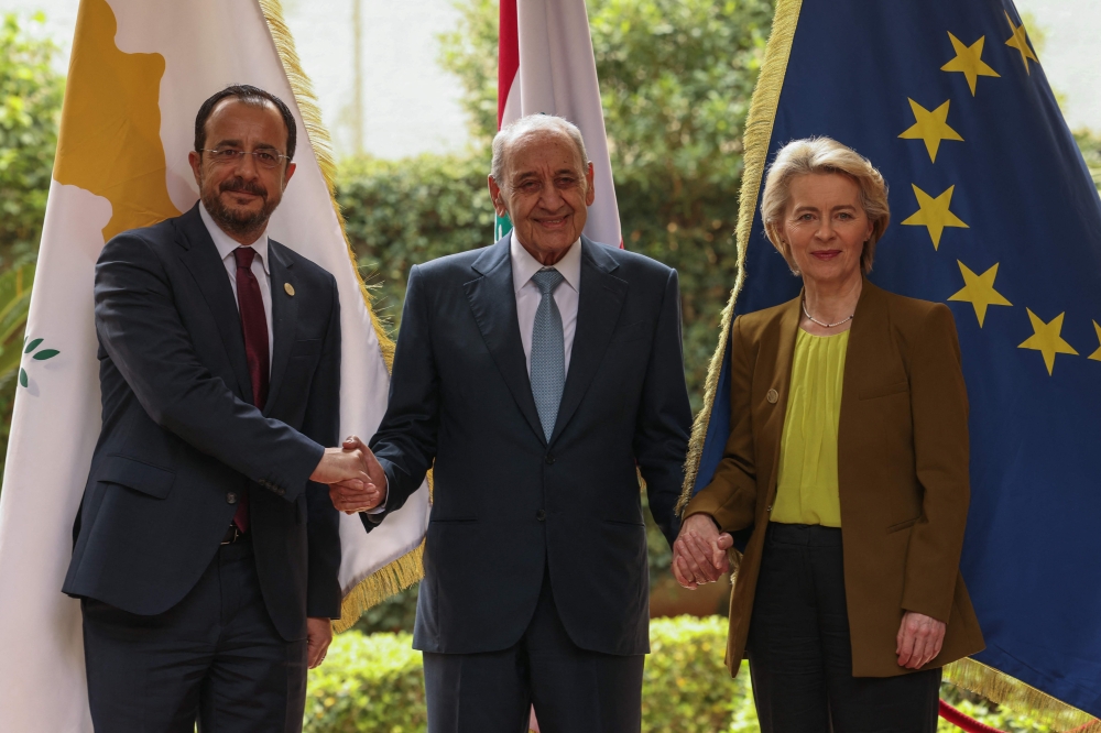 Lebanon's Parliament Speaker Nabih Berri (C) poses for pictures with European Commission President Ursula von der Leyen (R) and Cypriot President Nikos Christodoulides in Beirut on May 2, 2024. Photo by Anwar AMRO / AFP.